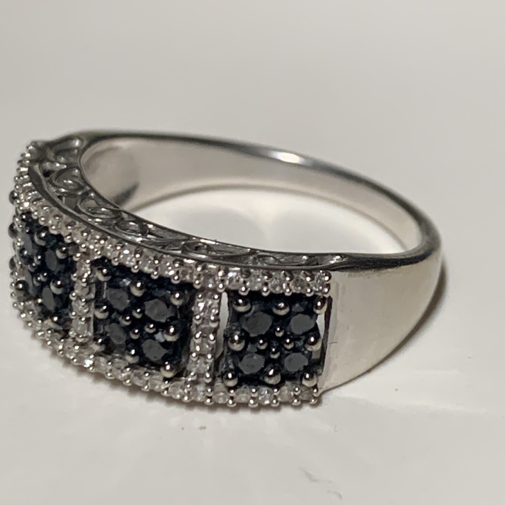 14k gold ring with black and white diamonds